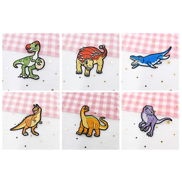 15 broderte strykemerker med dinosaurmotiver