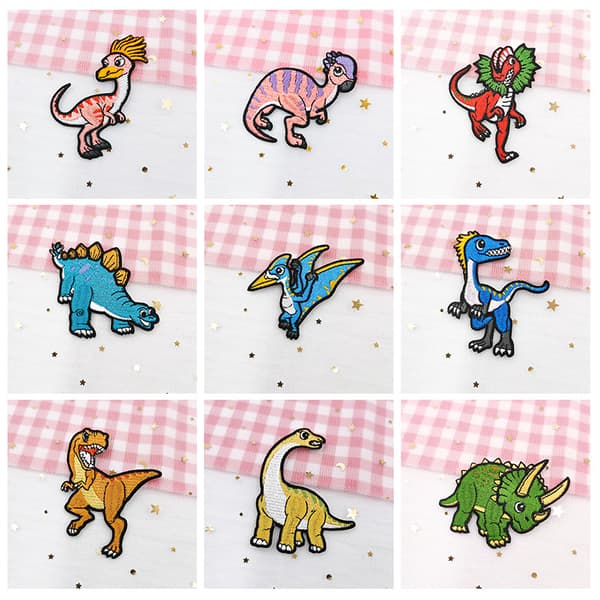 15 broderte strykemerker med dinosaurmotiver