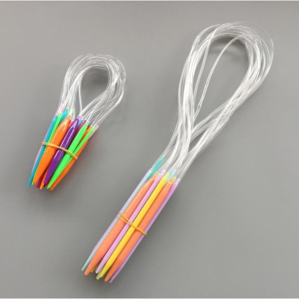 N049 - Set med 12 st. färgglada rundstickor 80 cm i plast multifärg one size