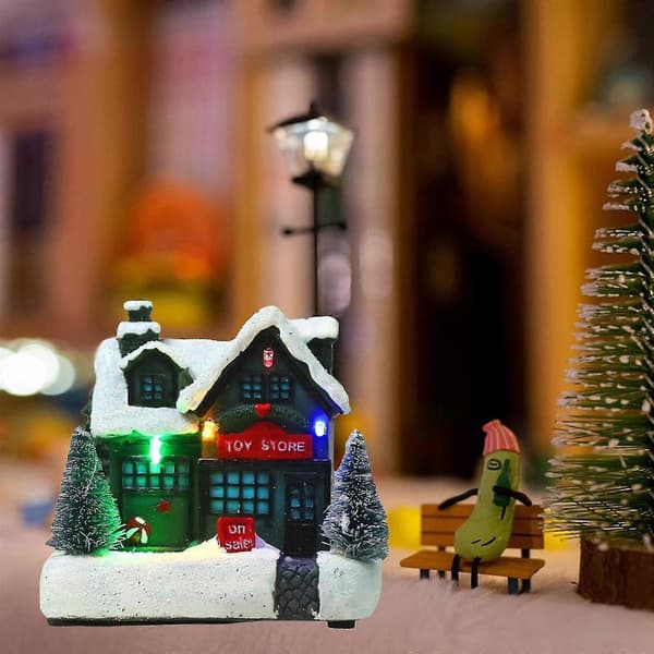 Julehus i harpiks med LED-lys, minivilla til juledekorasjon på bord