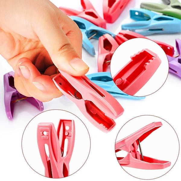 Clips för att fästa handdukar på strand- och solstolar