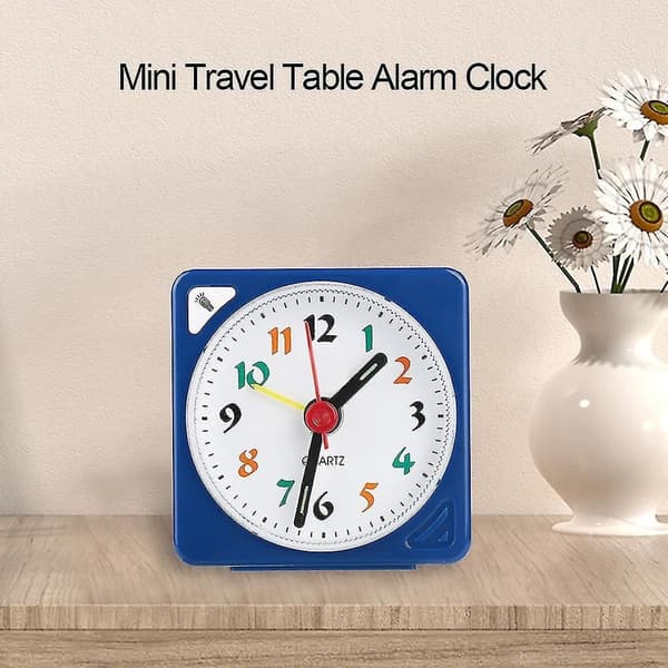 Mini Travel Alarm Clock: Quartz LED Light, Snooze Function, Battery Powered