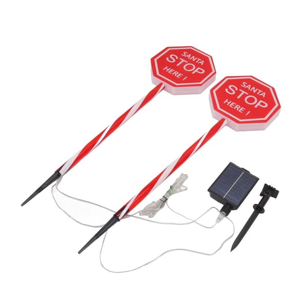 Vedenpitävä LED-aurinkolamppu \"Santa Stop Here\" -kyltillä. KLB