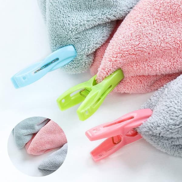 Clips för att fästa handdukar på strand- och solstolar