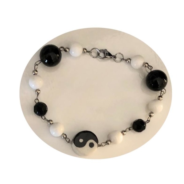 armband i svartvitt fina yin yang 21 cm