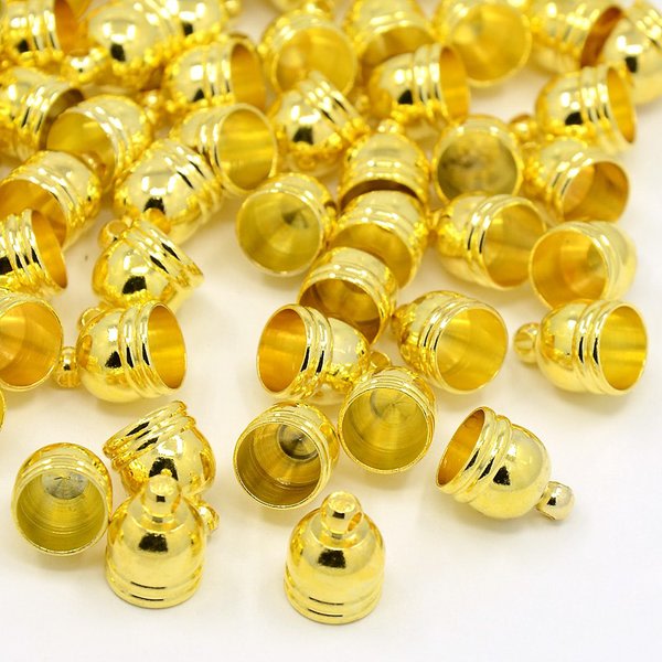 40 stora guldfärgade pärlhattar