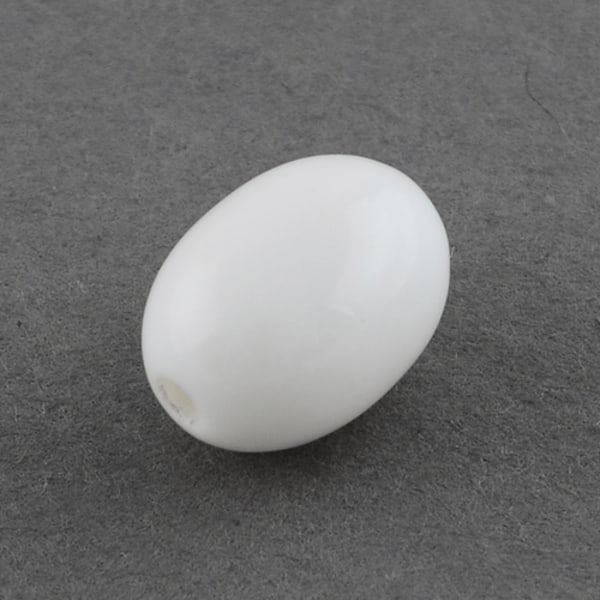 70 vita ovala pärlor akryl