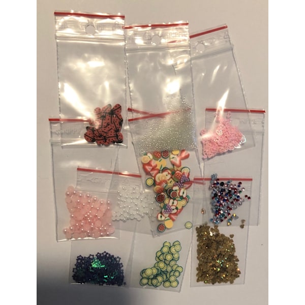 10 sorter olika nageldekorationer kit