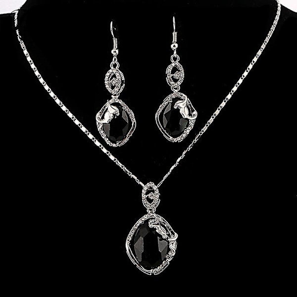 Silverpläterad kedja Bröllopssmycken Set Svart Kristall Dingla örhängen Geometriskt hjärta Ovalt hänge Halsband Set Dam Trendigt