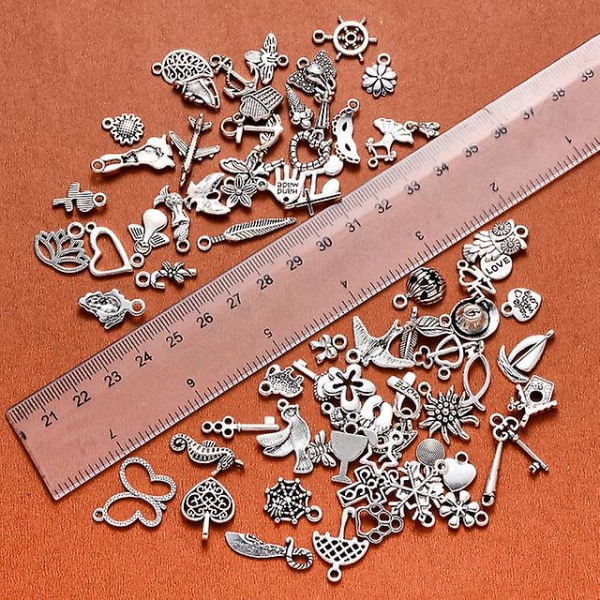 100 stk blandet ingen gjentatt sølv glatt metall charms anheng Gjør-det-selv for halskjede armbånd dingle smykker å lage og lage, dyre sjarm