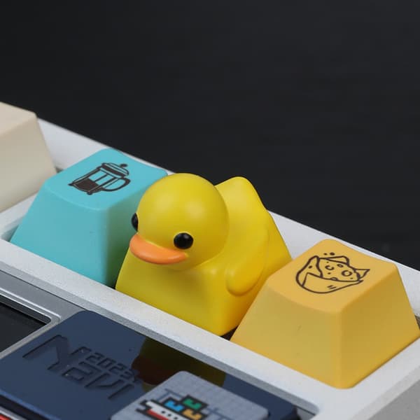 Yndig Andeformet Skrivebordslegetøj Nøglering Elastisk Resin Keycap Til Angstreduktion Yellow