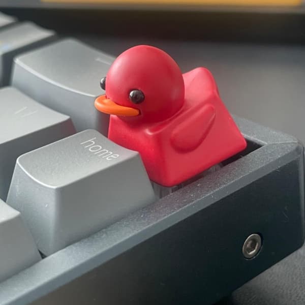 Yndig Andeformet Skrivebordslegetøj Nøglering Elastisk Resin Keycap Til Angstreduktion Yellow