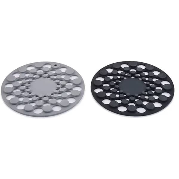 Sæt med 2 silikone coasters, varmebestandige dækkeservietter til varme gryder og pander, Sort/Grå