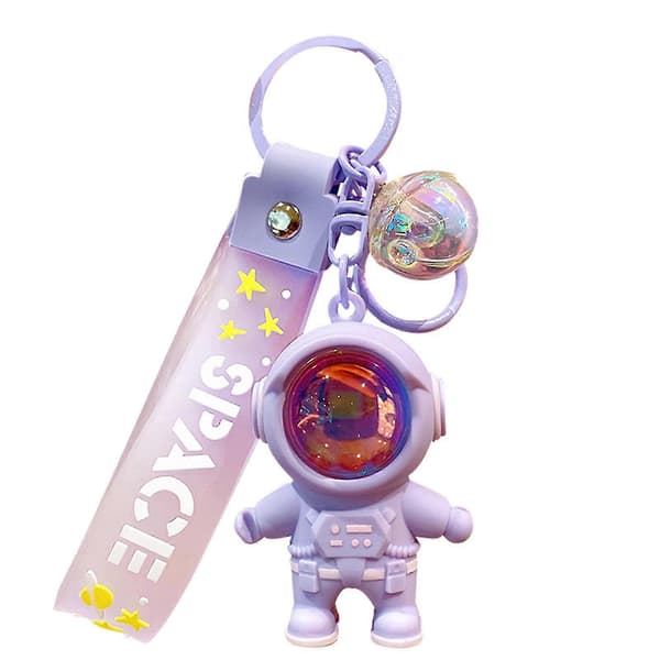 Kreativ rumastronaut nøglering med solnedgangsprojektor lysende ornamentgave