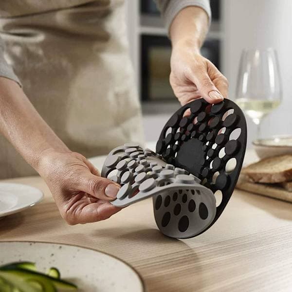 Sæt med 2 silikone coasters, varmebestandige dækkeservietter til varme gryder og pander, Sort/Grå