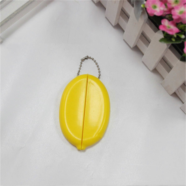 Pieni soikea kolikkokukkaro, jossa säilytetään kolikoita, minikolikkokukkaro, kolikkotelineet ketjulla miehille ja naisille Yellow