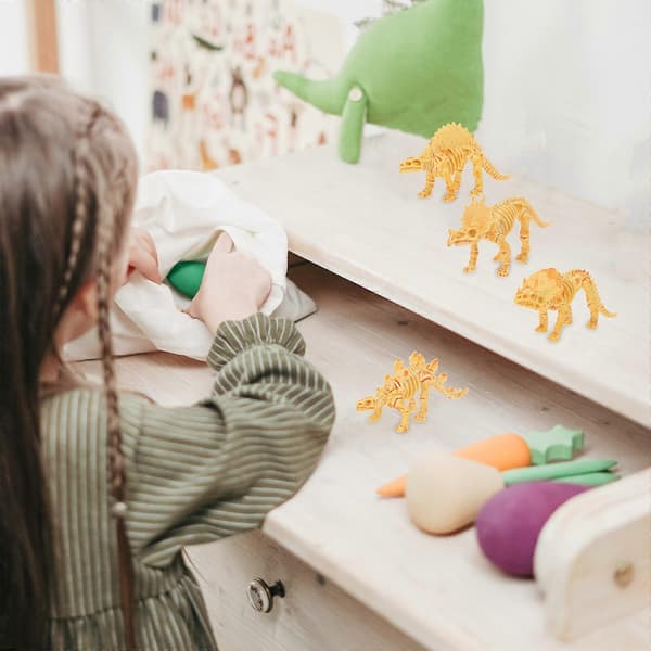 Gyllene plastdinosaurieskelettleksak för lek 12-delars barnset