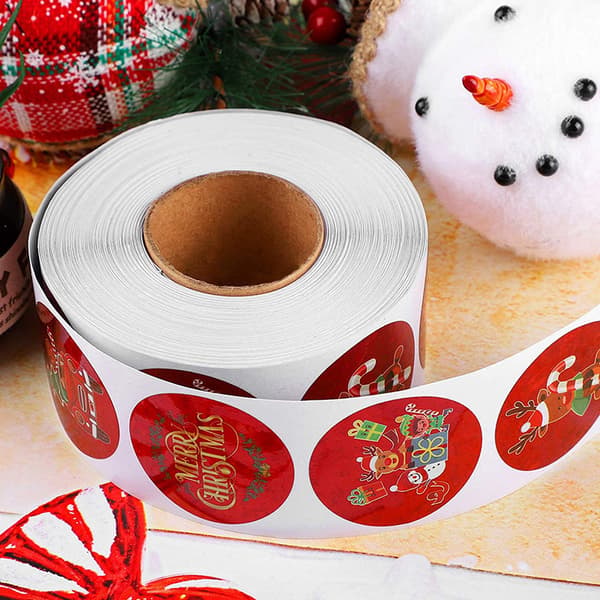 2,5 cm punainen tarra tekstillä \"God Jul\"