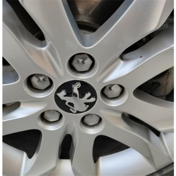 Set med 4 svarta Peugeot-navkapslar - Krom