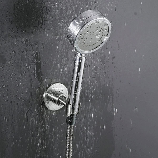 A silver perforated shower bracket with fixed base shower head universal adjustable shower accessories shower head hanger