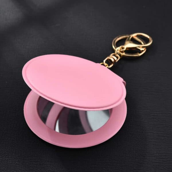 Nyckelring i läder med dubbel sminkspegel rosa