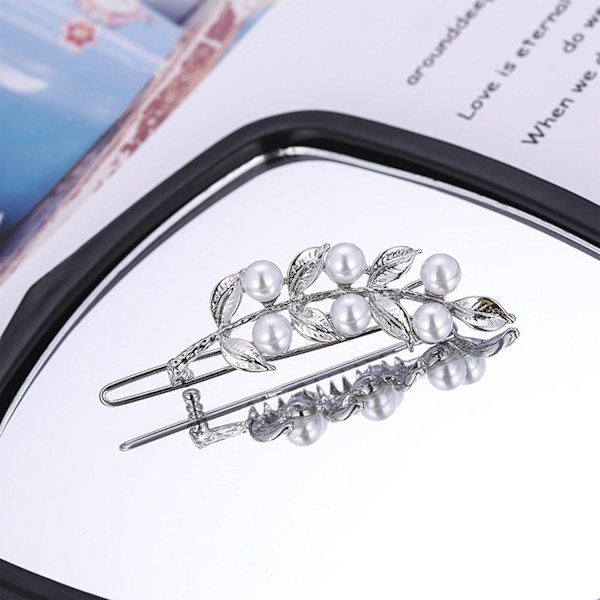 Bohemia Pearl Hair Clips är gjorda av högkvalitativ legering och pärla, uppfyller dina dagliga krav på kläder.Silver Pearl Leaf Barr