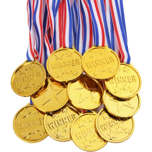 28 stycken barnmedaljer, plastguldmedalj med halsband