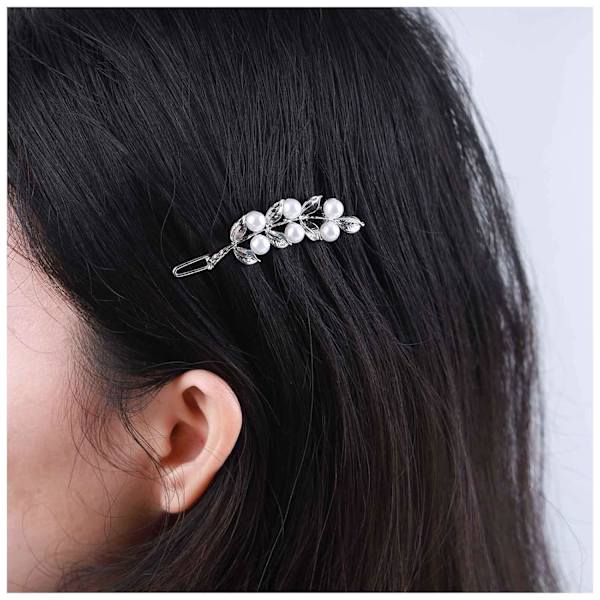 Bohemia Pearl Hair Clips är gjorda av högkvalitativ legering och pärla, uppfyller dina dagliga krav på kläder.Silver Pearl Leaf Barr