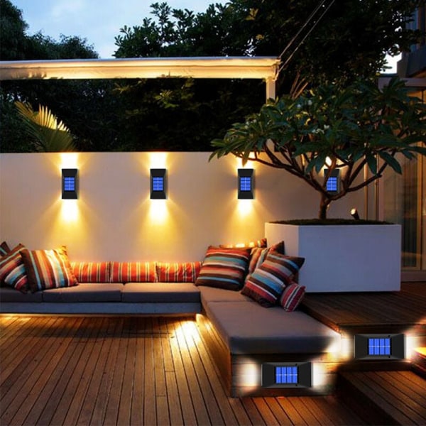 Sæt med 4 varmt lys udendørs væglamper udendørs dekorativ solcelle