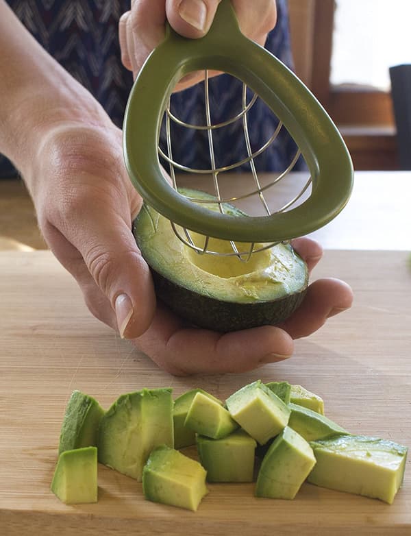 Avocado Kutter Kubisk Form Kokkekonsept