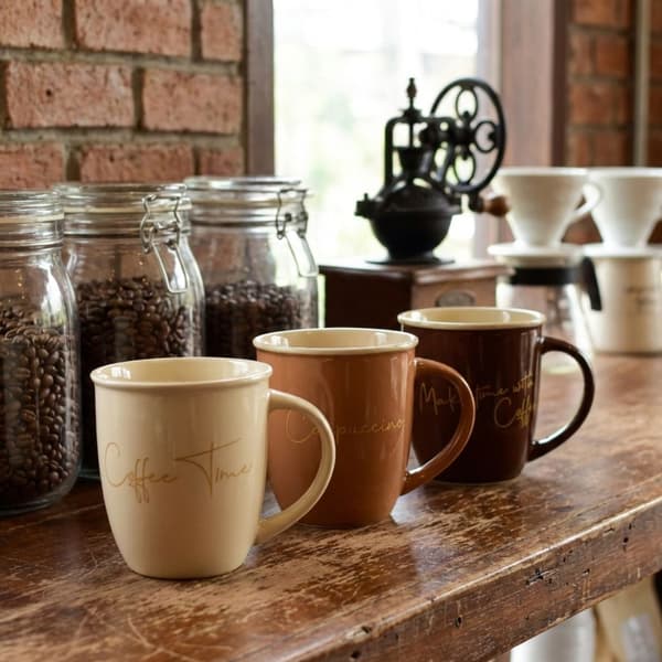 Porslinsmugg HENDIA Coffee Time 9x13x10 cm Ljusbeige 1-pack