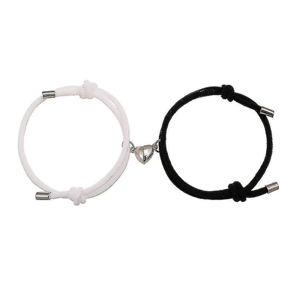 Pararmband, 2st matchande kärlekshjärthänge (svart+vit)