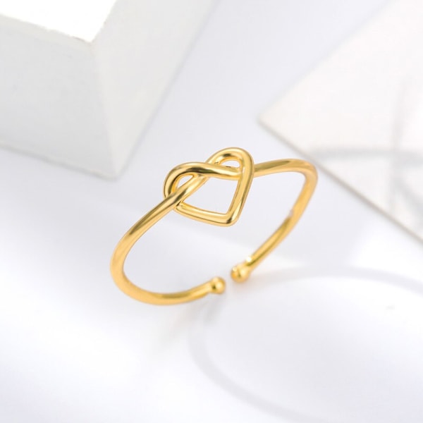 Romantiska hjärtstapelbara ringar för kvinnor bröllopssmycken i rostfritt stål justerbara knutringar Brudtärnapresenter Rose Gold Color Resizable