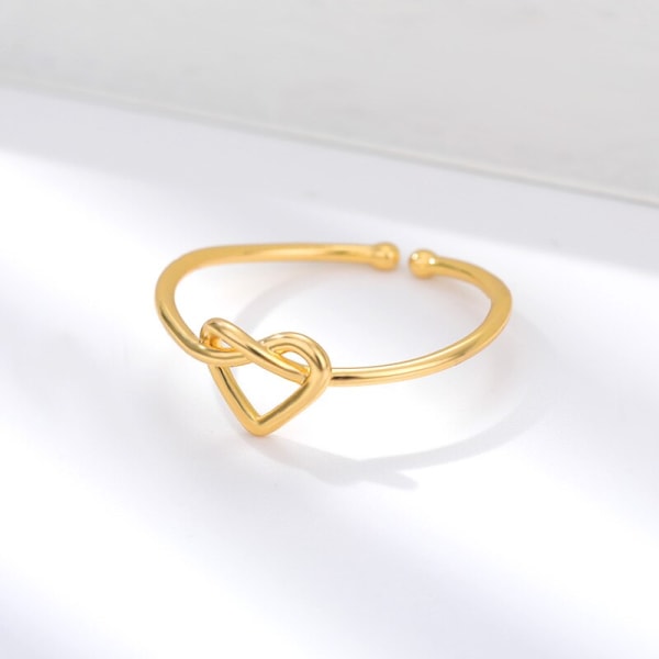 Romantiska hjärtstapelbara ringar för kvinnor bröllopssmycken i rostfritt stål justerbara knutringar Brudtärnapresenter Rose Gold Color Resizable