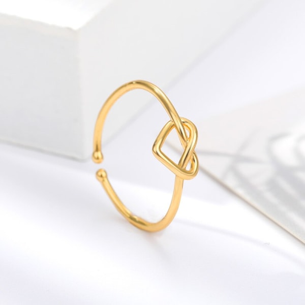Romantiska hjärtstapelbara ringar för kvinnor bröllopssmycken i rostfritt stål justerbara knutringar Brudtärnapresenter Gold-color Resizable