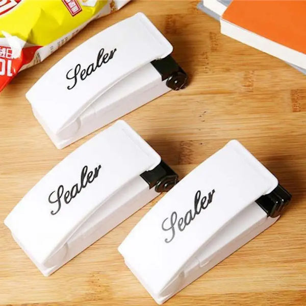 Värme Snack Förseglingsmaskin Förseglad förpackning Matpåsar Värmeförseglare Handy Sticker Hållare Food Saver Förvaring Kökstillbehör 1pc