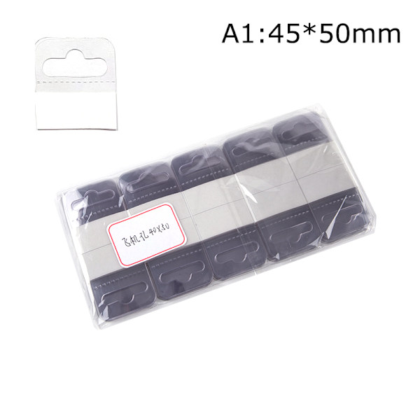 100 st PVC Spår Hål Självhäftande hängetiketter Krok Merchandise Box Ba A1