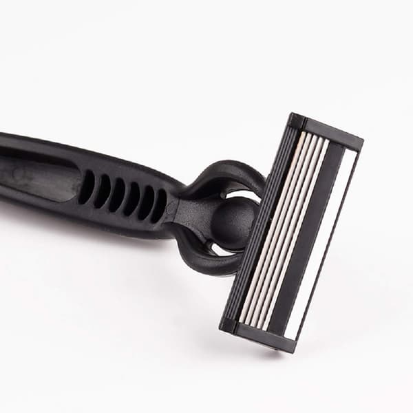 Skraber inklusive 4 ekstra genopfyldelige barberhoveder