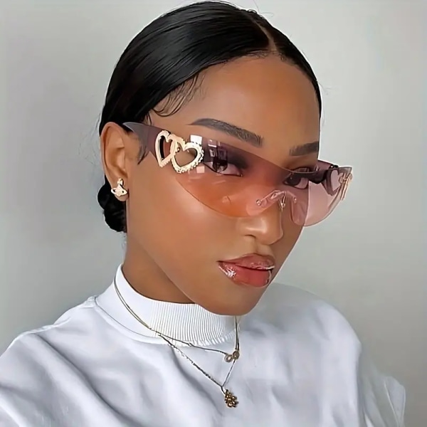 Solglasögon utan båg omlott metall ihåliga hjärtskydd Glasögon enfärgade reseglasögon för kvinnor