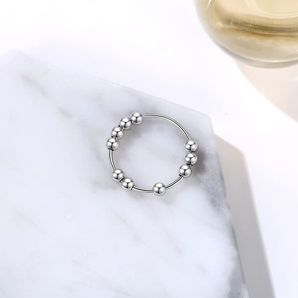 Antistressring med 10 roterende perler kobber sølv 20,5 mm