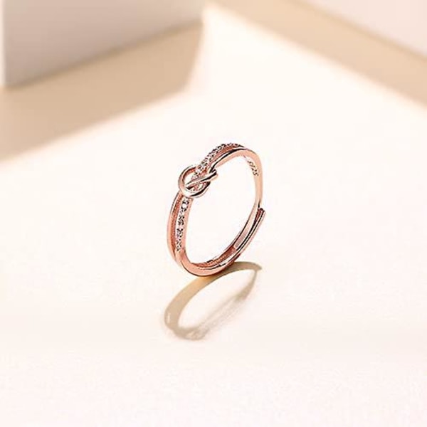 Elegant 925 Sterling Silver Kubisk Zirkonia Kärleksknutsring för kvinnor.  Evigt länkad justerbar tumring i roséguld. Perfekt smyckesgåva