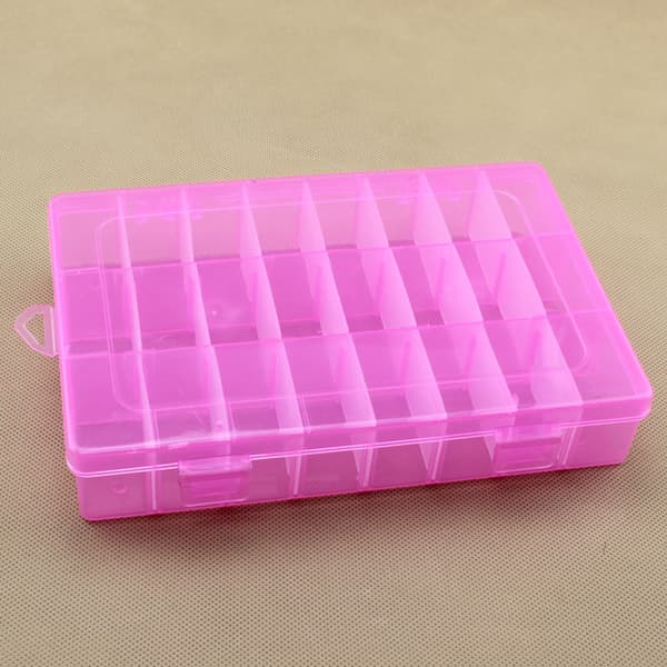 Two transparent plastic storage boxes, which can be used to store embroidery floss and organize sewing accessories. Pink