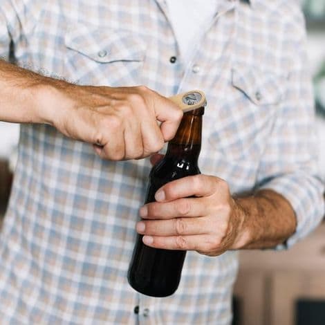 Bærbar og holdbar flaskeåbner med træ- og rustfrit stål-design
