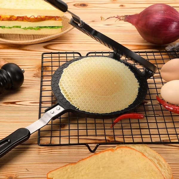 Dobbeltsidig non-stick form for sprø eggruller, vaffelkjeks og tynne kaker.