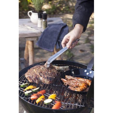 Høykvalitets buede grilltenger, som tilbyr balansert elastisitet og et presist grep.