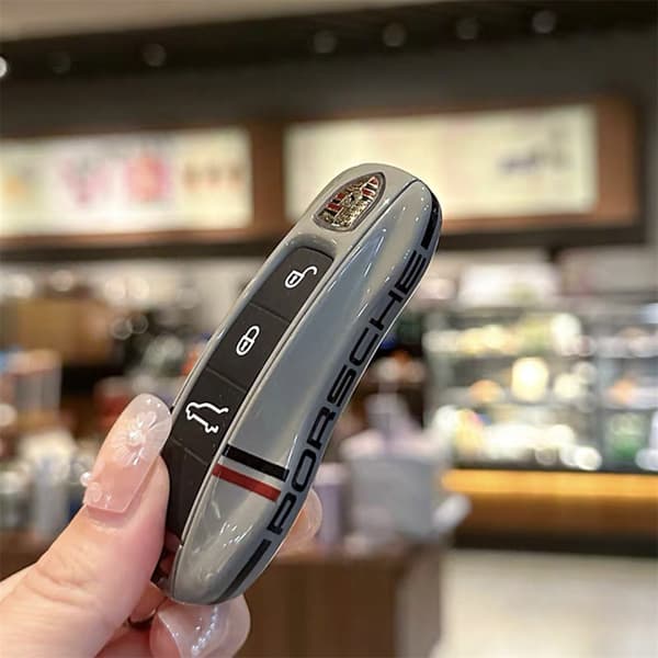 Fits Porsche Key Case, including new Cayenne, 718, Macan, Panamera, Taycan, and 911. Key case with insert function. White