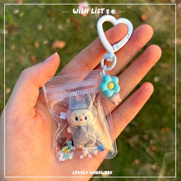 Ny Flocking Mini Labubu Vinyl Spirende Utsøkt Nøkkelring Søt Veske Mobiltelefon Dukke Gave Anheng Tilbehør Kawaii Leker Gave (FMY) k
