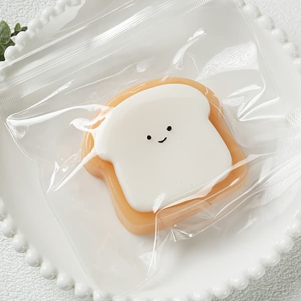 Squishy Toast Leksaker, Kawaii Stresslindring, Alla Åldrar language