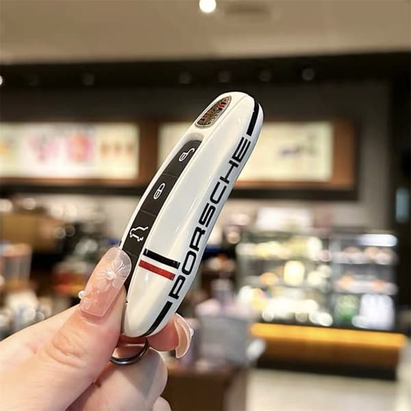 Fits Porsche Key Case, including new Cayenne, 718, Macan, Panamera, Taycan, and 911. Key case with insert function. White