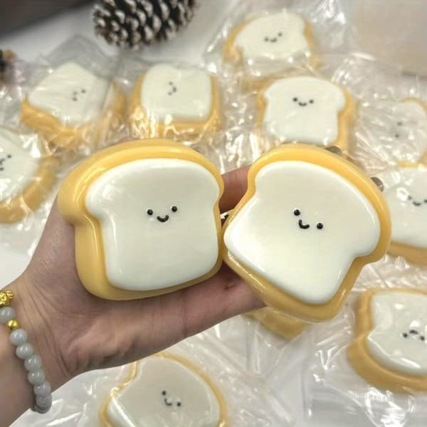 Squishy Toast Leksaker, Kawaii Stresslindring, Alla Åldrar language